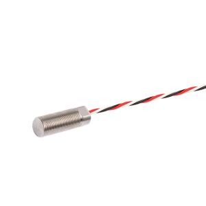 A cylindrical VPA Series Analog Ferrous Metal Proximity Sensor with a threaded body and two attached twisted wires—one red and black, the other white—extends from the sensor’s end against a white background. by Standex Detect