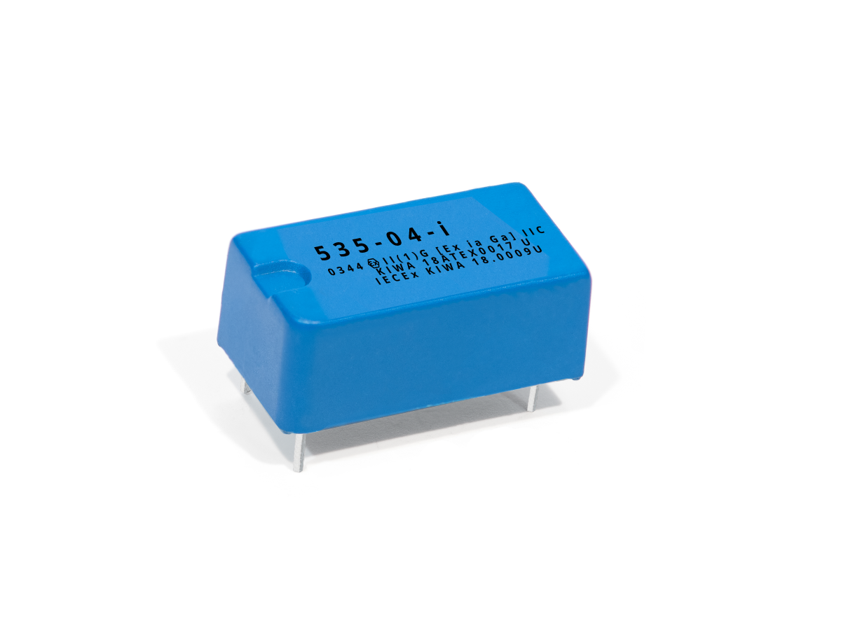 A small blue 535 Series Optocouplers component with four metal pins, featuring black printed text and numbers on its top surface, placed on a white background. by Standex Detect