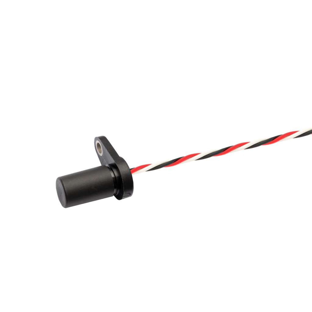 A black cylindrical position sensor with a flange and mounting hole, designed for metal detection, attached to a twisted red, black, and white wire, set against a white background. by Standex Detect