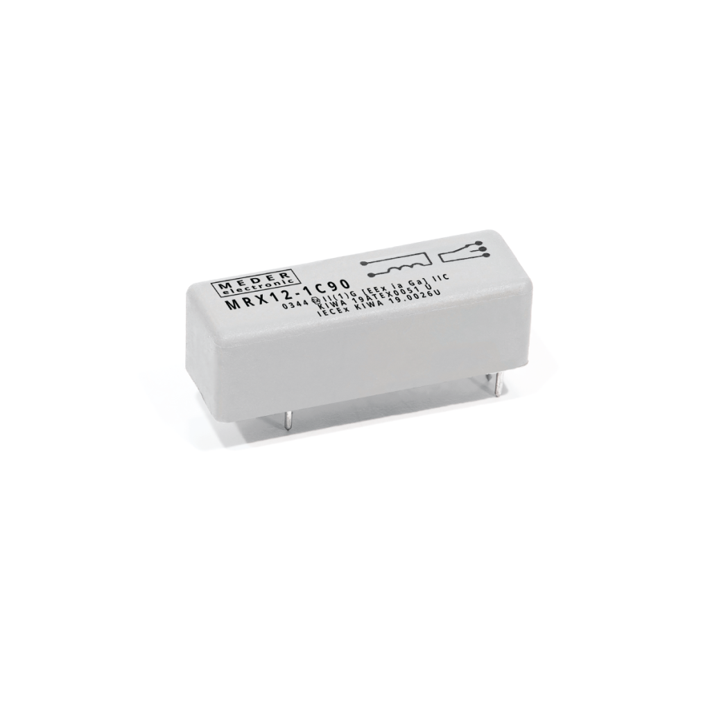 A rectangular silver Reed Relay electronic component with four pins on the bottom and black printed text and symbols on the top side, isolated on a white background. by Standex Detect