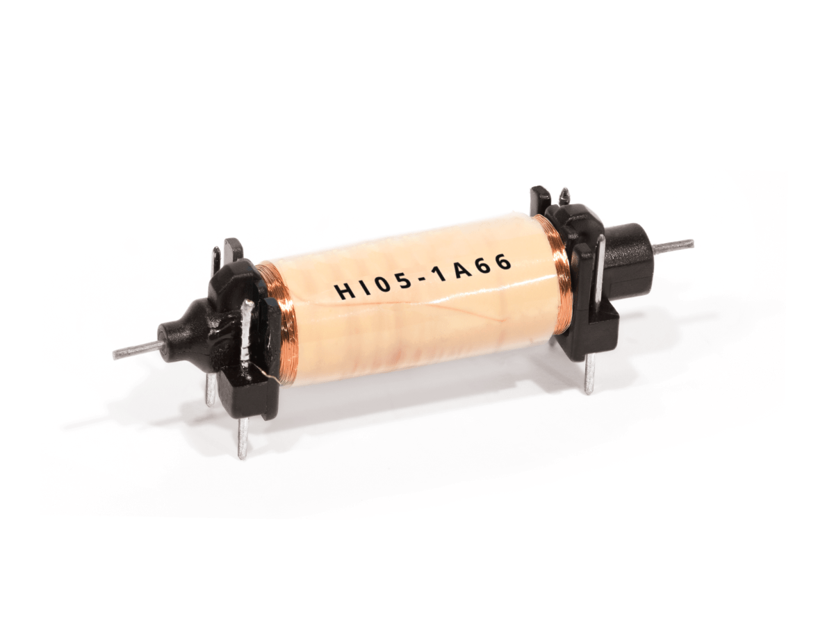 A cylindrical electronic component from the HI Series with copper wire coils and black plastic end mounts, labeled H105-1A66, featuring metal pins for mounting—commonly used as a Reed Relay in electronic circuits. by Standex Detect