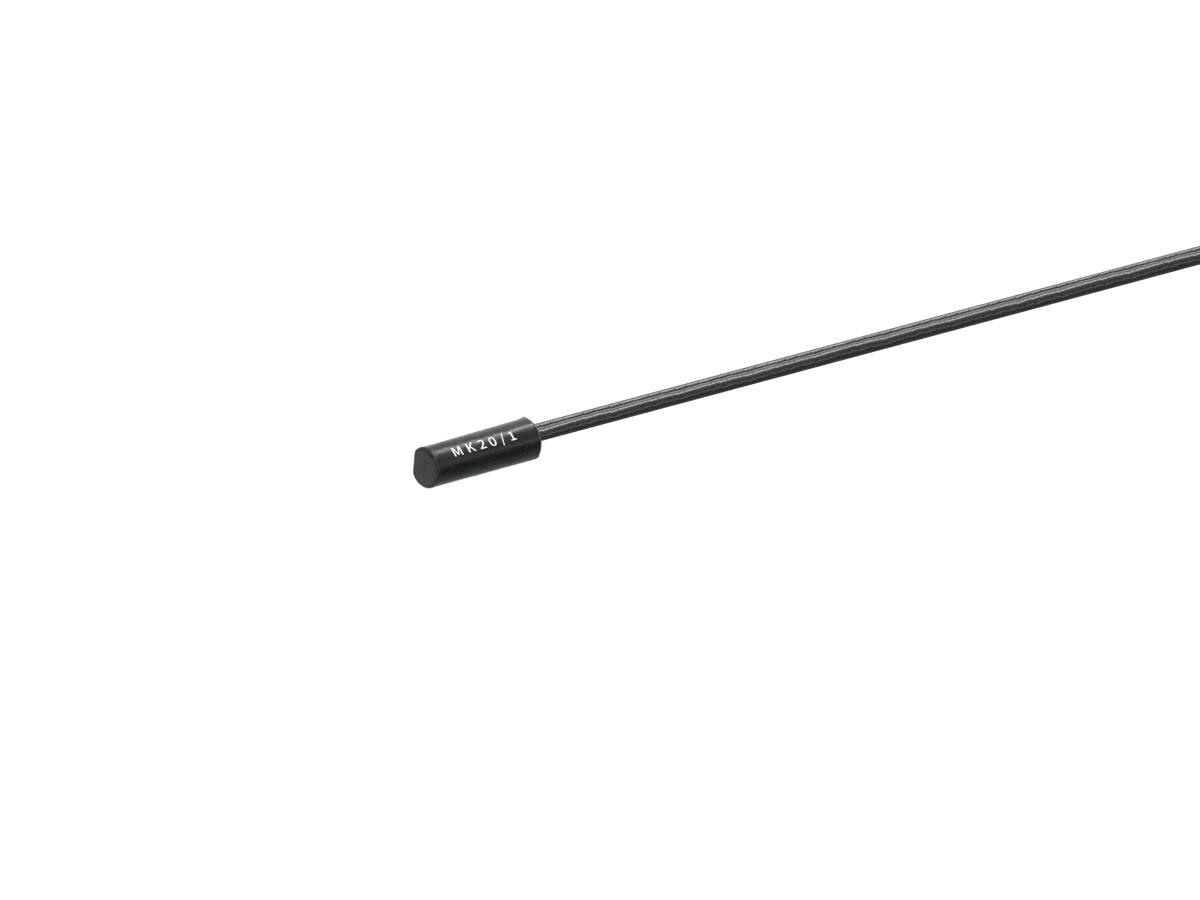A close-up of a thin, black, cylindrical rod or probe, identified as an MK20/1 Series Reed Sensor with a small, solid end, shown on a white background. by Standex Detect