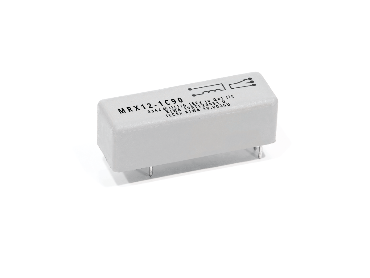 A rectangular MRX Series electronic component, likely a reed relay, labeled MRX12-1C90 with technical details and a pin diagram on its top surface. The component features four metal pins at the bottom. by Standex Detect