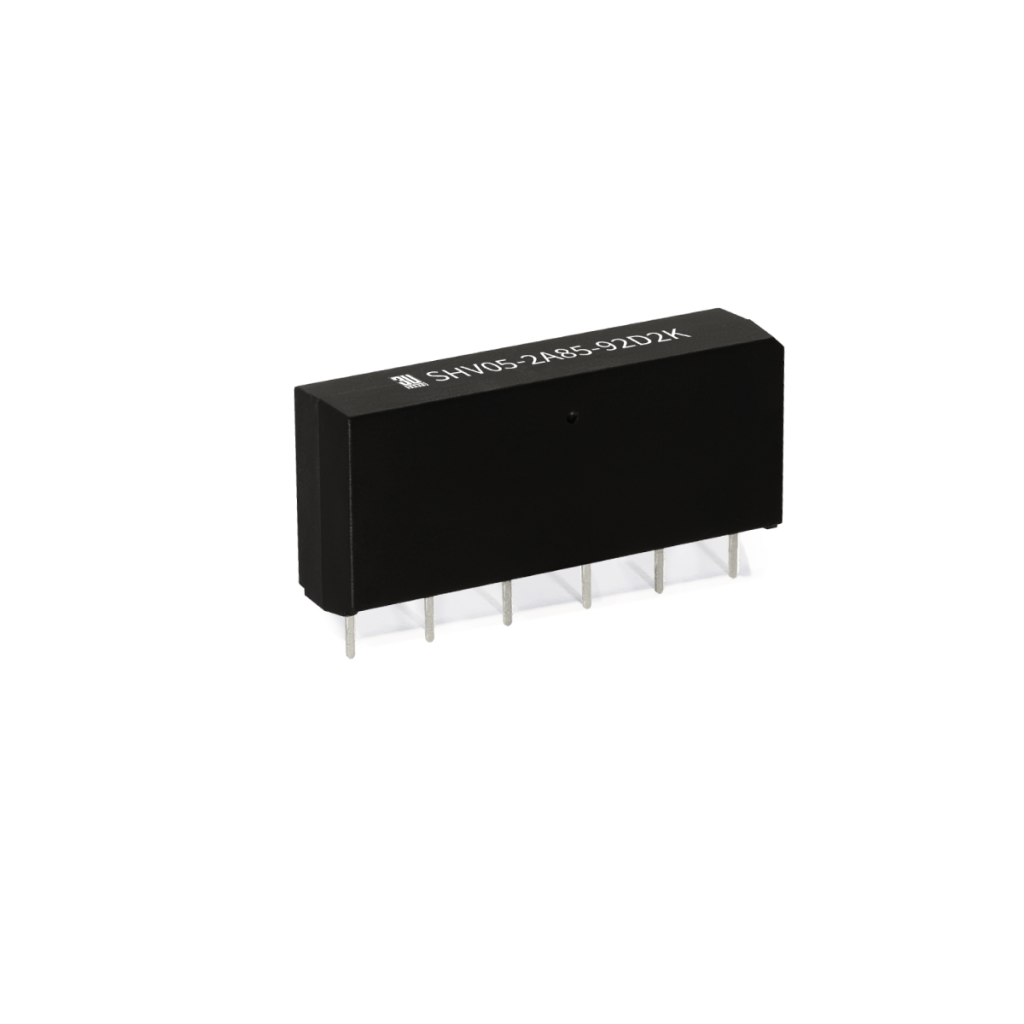 SHV-2A Series Reed Relay with six metal pins, viewed at an angle on a white background. The top surface is labeled with white alphanumeric text. by Standex Detect